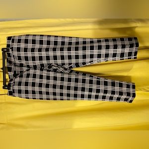 Women’s Black and White dress pants.